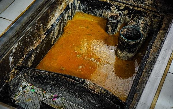 regular grease trap cleaning helps prevent grease and oil from polluting water sources